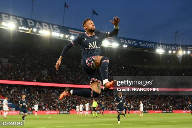 Paris Saint-Germain's Brazilian forward Neymar celebrates scoring his team's first goal during the French L1 football match between Paris-Saint...