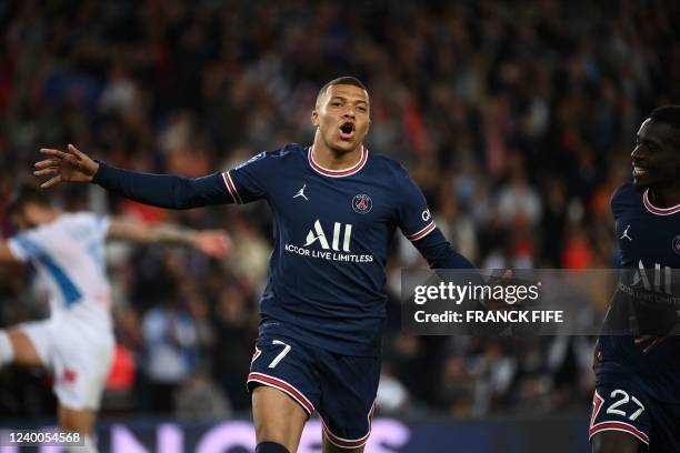 Paris Saint-Germain's French forward Kylian Mbappe celebrates scoring his team's second goal during the French L1 football match between Paris-Saint...