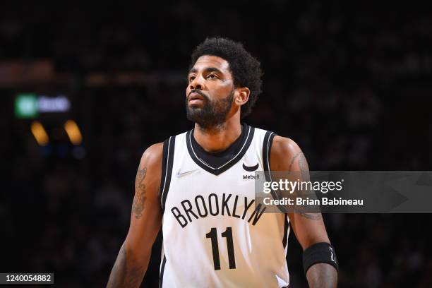 Kyrie Irving of the Brooklyn Nets looks on during Round 1 Game 1 of the 2022 NBA Playoffs on April 17, 2022 at the TD Garden in Boston,...