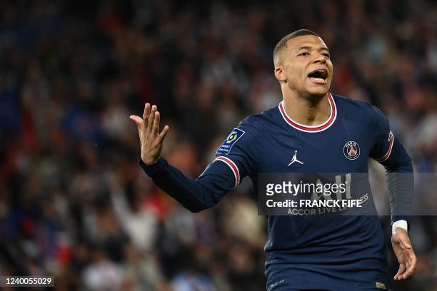 Paris Saint-Germain's French forward Kylian Mbappe celebrates scoring his team's second goal during the French L1 football match between Paris-Saint...