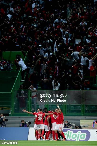 Darwin Nunez of SL Benfica celebrates with teammates after scoring during the Portuguese League football match between Sporting CP and SL Benfica at...