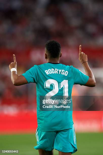 Rodrygo of Real Madrid celebrates after scoring his sides first goal during the LaLiga Santander match between Sevilla FC and Real Madrid CF at...