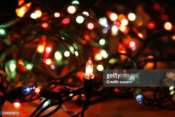 christmas lights - tangled christmas lights stock-fotos und bilder