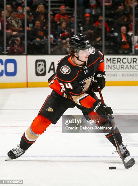 Jamie Drysdale of the Anaheim Ducks skates with the puck during the first period against the Columbus Blue Jackets at Honda Center on April 17, 2022...