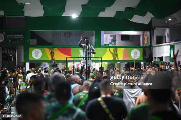 February 2022, Brazil, Rio De Janeiro: Vitor "Vitinho" César Ferreira, the "mestre de bateria" , gestures during the rehearsal of the percussion...