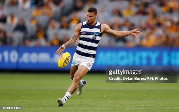 Brandan Parfitt of the Cats kicks the ball during the 2022 AFL Round 05 match between the Hawthorn Hawks and the Geelong Cats at the Melbourne...