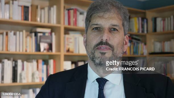Raphael Chenuil-Hazan, executive director of "Ensemble contre la peine de mort" poses on April 13, 2022 at the Consular Residence of France in...