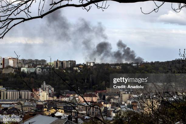 Smoke rises after five aimed missile strikes hit Lviv, Ukraine on April 18, 2022.