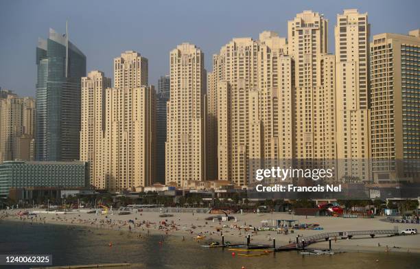 People enjoy the sunshine and relax on the beach at JBR Beach on June 01, 2020 in Dubai, United Arab Emirates.