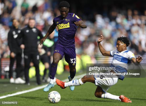 Queens Park Rangers' Sam McCallum challenges Derby County's Malcolm Ebiowei during the Sky Bet Championship match at the Kiyan Prince Foundation...