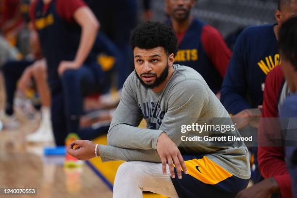 Jamal Murray of the Denver Nuggets stretches during the Denver Nuggets practice on April 15, 2022 at Chase Center in San Francisco, CA. NOTE TO USER:...