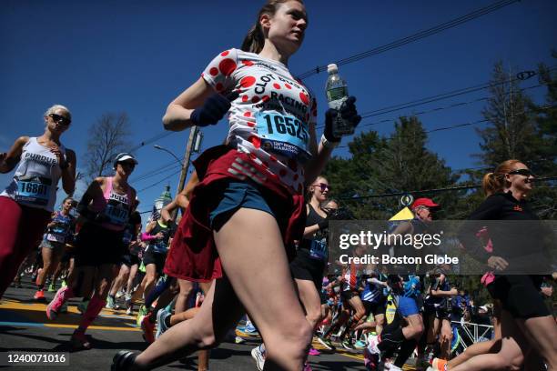 Hopkinton, MA Kim Elia departs the start during the running of the 126th Boston Marathon in Hopkinton, MA on April 18, 2022.