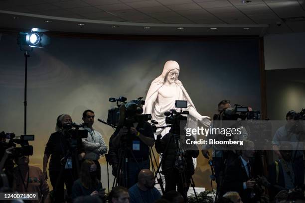 Statue of Jesus Christ behind members of the media during an open house at the Washington D.C. Temple of The Church of Jesus Christ of Latter-day...