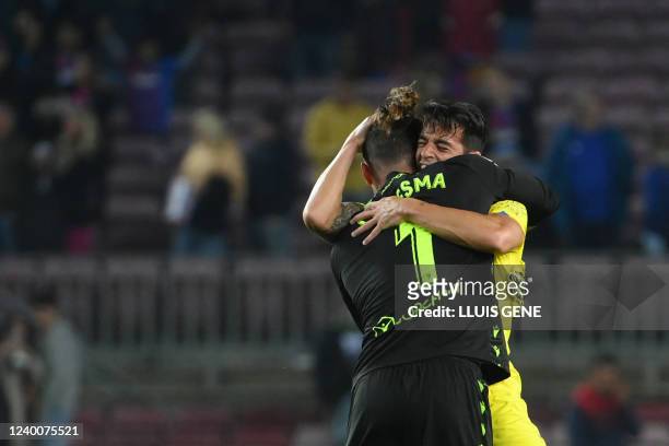 Cadiz's Argentinian goalkeeper Jeremias Ledesma celebrates with teammate their victory at the end of the Spanish League football match between FC...