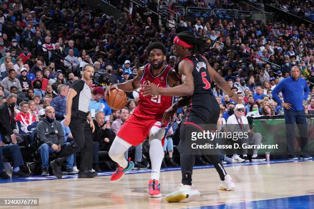 Joel Embiid of the Philadelphia 76ers handles the ball against the Toronto Raptors during Round 1 Game 2 of the 2022 NBA Playoffs on April 18, 2022...