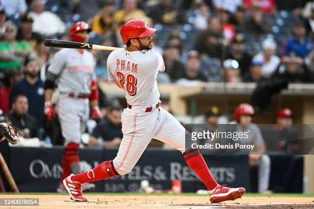 Tommy Pham of the Cincinnati Reds hits asolo home run during the first inning of a baseball game against the San Diego Padres at Petco Park on April...