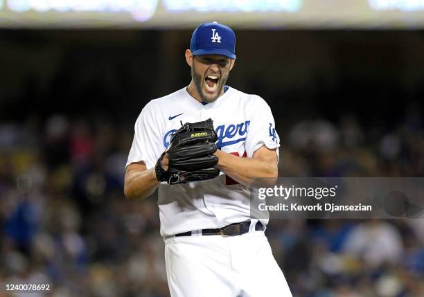 Starting pitcher Clayton Kershaw of the Los Angeles Dodgers celebrates after the last out of the fourth inning against Atlanta Braves at Dodger...