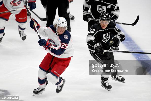 Columbus Blue Jackets Right Wing Patrik Laine and Los Angeles Kings Winger Trevor Moore skate towards the play during a Los Angeles Kings game versus...