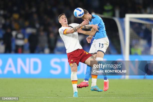 Romas Italian forward Nicolo Zaniolo challenges for the ball with SSC Napoli's Kossovari defender Amir Rrahmani during the Serie A football match...