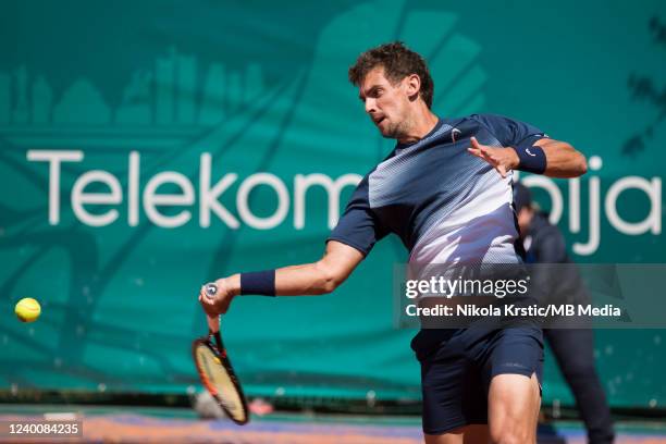 Henri Laaksonen of Switzerland returns against Jiri Lehecka of Czech Republic during the day two of Serbia Open ATP 250 Tournament at Novak Tennis...