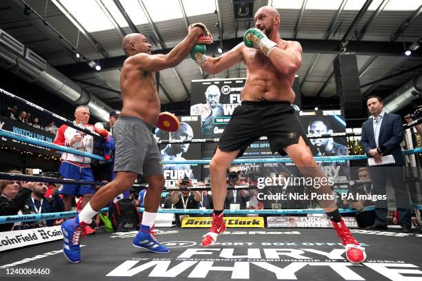 Tyson Fury with trainer SugarHill Steward during an open workout at BOXPARK Wembley, London. Picture date: Tuesday April 19, 2022.