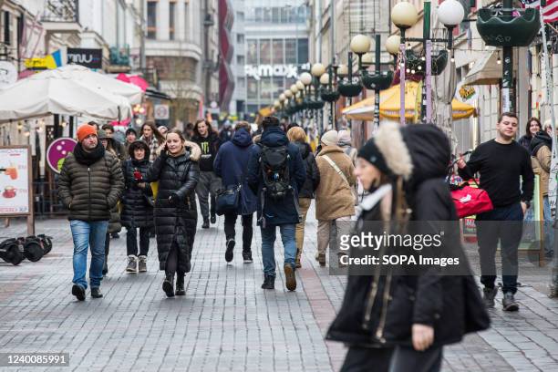 Crowd of people seen on Chmielna Street in Warsaw.