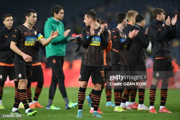 Shakhtar Donetsk's players applaud at the end of the "Global Tour for Peace" friendly charity football match between Fenerbahce and Shakhtar Donetsk...