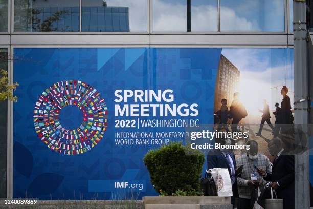 International Monetary Fund and World Bank spring meetings signage outside the IMF headquarters in Washington, D.C., U.S., on Tuesday, April 19,...