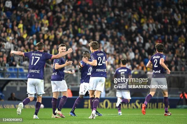 Toulouses players celebrate a goal during the French L2 football match between FC Sochaux-Montbeliard and Toulouse FC at the Auguste Bonal Stadium in...
