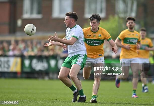 London , United Kingdom - 17 April 2022; James Hynes of London in action against Pearce Dolan of Leitrim during the Connacht GAA Football Senior...