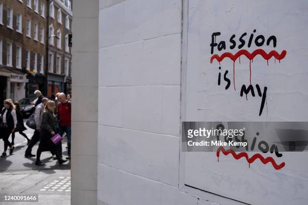 Fashion graffiti 'Fassion in my pashion' in Soho on 10th April 2022 in London, United Kingdom.