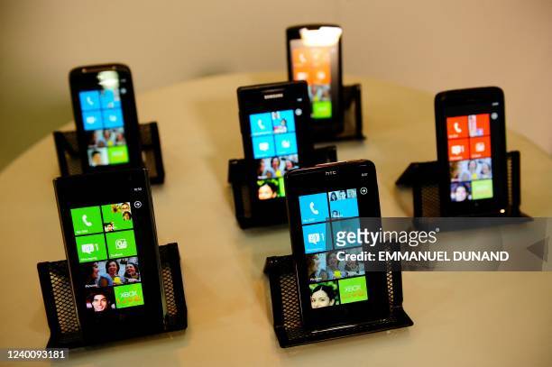 Devices running Windows Phone 7 are on display, a new mobile phone operating system as Microsoft seeks to regain ground lost to the iPhone,...