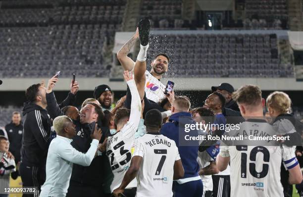 Fulham's Aleksandar Mitrovic is lifted aloft during the Sky Bet Championship match between Fulham and Preston North End at Craven Cottage on April...