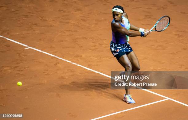 Cori Gauff of the United States plays a backhand against Daria Kasatkina of Russia in her first round match on Day 2 of the Porsche Tennis Grand Prix...