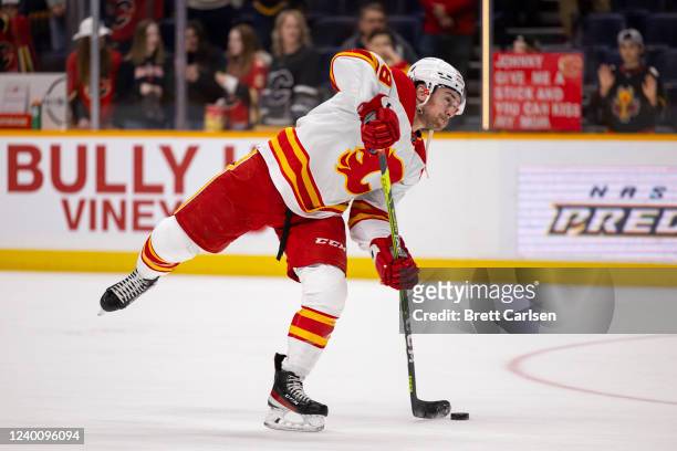 Andrew Mangiapane of the Calgary Flames warms up before the game against the Nashville Predators at Bridgestone Arena on April 19, 2022 in Nashville,...