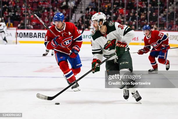 Minnesota Wild right wing Ryan Hartman plays the puck during the Minnesota Wild versus the Montreal Canadiens game on April 19, 2022 at Bell Centre...