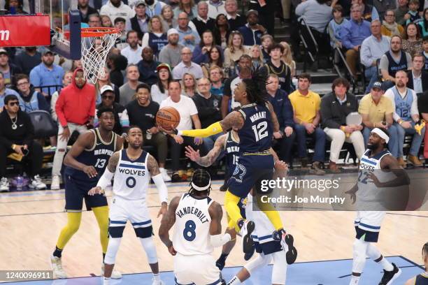 Ja Morant of the Memphis Grizzlies drives to the basket against the Minnesota Timberwolves during Round 1 Game 2 of the 2022 NBA Playoffs on April...