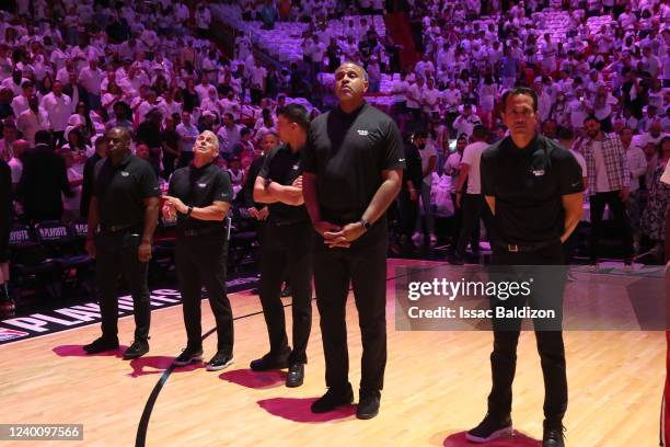 Assistant Coaches Anthony Carter, Octavio De La Grana, Eric Glass, Malik Allen, and Head Coach Erik Spoelstra of the Miami Heat stand for the...