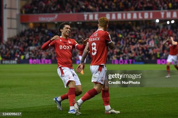 Brennan Johnson of Nottingham Forest celebrates with Jack Colback, after scoring his sides third goal during the Sky Bet Championship match between...