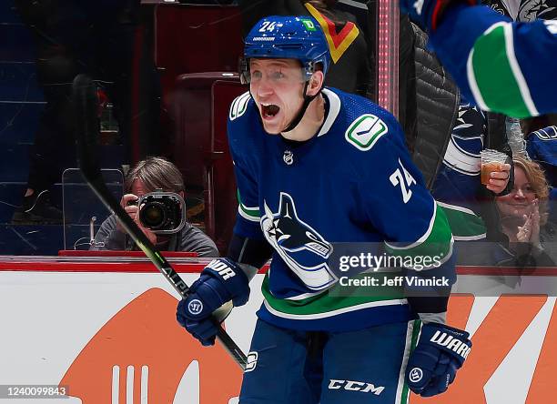 Travis Dermott of the Vancouver Canucks celebrates after scoring during their NHL game against the Ottawa Senators at Rogers Arena April 19, 2022 in...