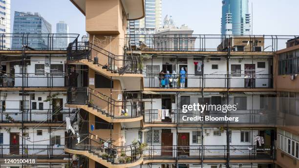 Quarantine workers in personal protective equipment at a residential building during a lockdown due to Covid-19 in Shanghai, China, on Wednesday, on...