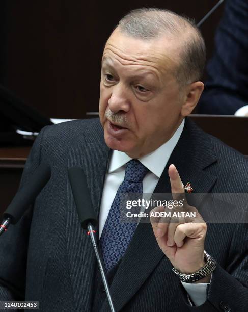 Turkish President and leader of the Justice and Development Party , Recep Tayyip Erdogan gestures as he gives a speech during a party parliamentary...