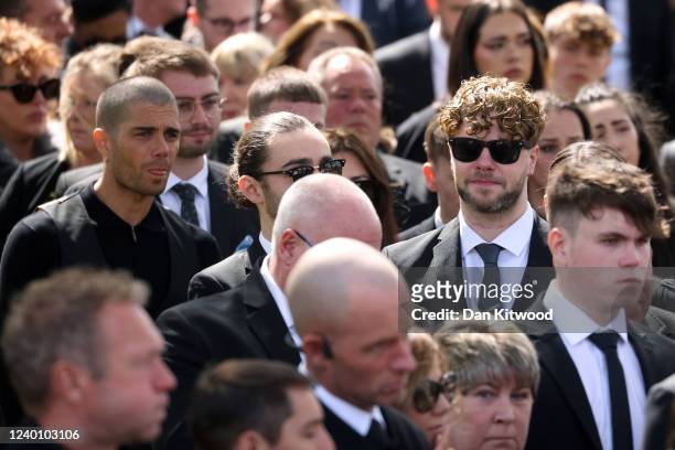 Tom Parker's bandmates from The Wanted, Max George and Jay McGuiness , leave St Francis of Assisi church following a funeral service for Tom Parker...