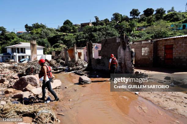 Members of the South African Police Service K9 search and rescue unit search for a missing 23 year old man in KwaNdengezi, west of Durban, on April...