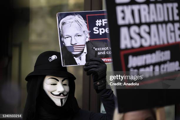 Supporters of Julian Assange protest outside the City of Westminster Magistrates Court in London, England on April 20, 2022. A British court on...