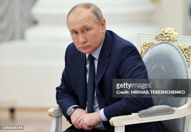 Russian President Vladimir Putin looks on as he holds a meeting of the Russia - Land of Opportunity platform supervisory board at the Catherine's...