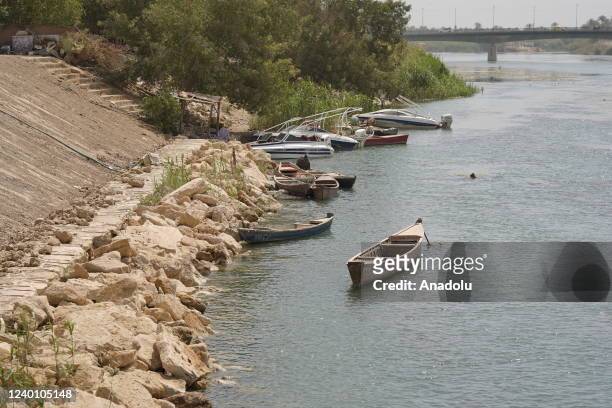 Handmade traditional wooden boats are seen on the Euphrates River in Najaf, Iraq on April 11, 2022. In the city of Najaf, where the Euphrates River...