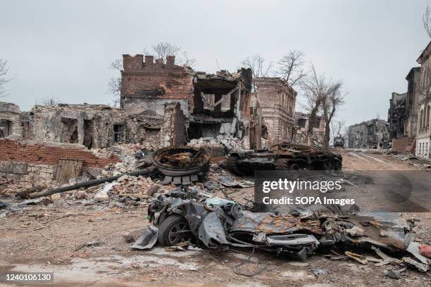 Flattened car and destroyed tank amidst the ruins of central Mariupol. The battle between Russian / Pro Russian forces and the defending Ukrainian...