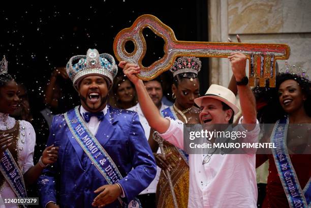 King Momo Wilson Dias da Costa Neto receives the keys to the city of Rio from from Rio's mayor Eduardo Paes during the official opening ceremony in...