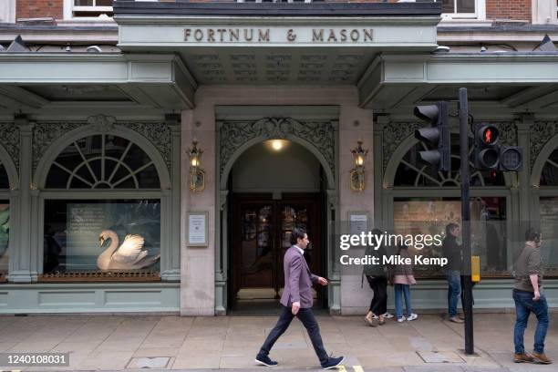 Red brickwork exterior of Fortnum & Mason, the famous high end department store on Piccadilly on 13th April 2022 in London, United Kingdom. Founded...